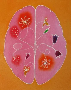 Illustrated pink brain with delicate floral designs growing through both hemispheres on a warm orange background, symbolizing brain health, memory, cognitive function, and mental wellness.